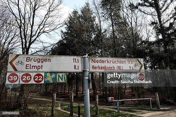 Cycling signs mark entry to Holland at Alte Zollstra§e lane on the German-Dutch border on February 11, 2016 near Elmpt, Germany. Despite an...