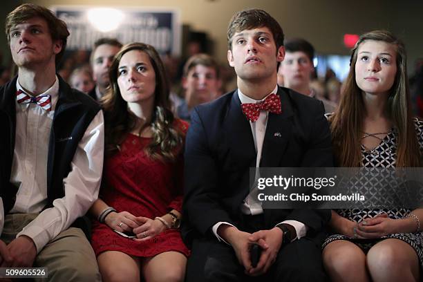 Students and their family members and guests listen to Republican presidential candidate Sen. Marco Rubio during a campaign town hall meeting at the...