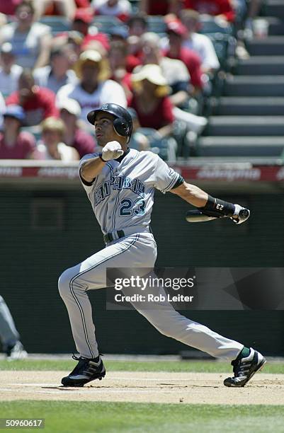 Infielder Julio Lugo of the Tampa Bay Devil Rays swings at an Anaheim Angels pitch during the game at Angel Stadium of Anaheim on May 9, 2004 in...