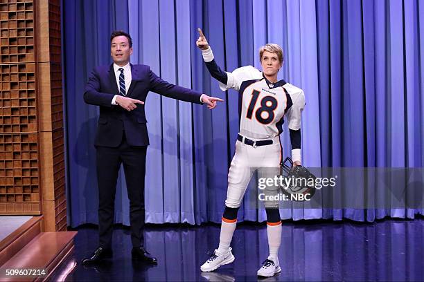 Episode 0416 -- Pictured: Host Jimmy Fallon welcomes actress Kristen Wiig dressed as Denver Bronco's quarterback Peyton Manning on February 11, 2016...