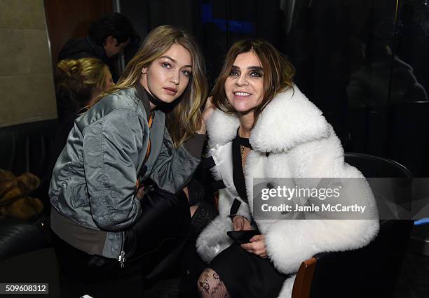 Gigi Hadid and Carine Roitfeld attend Kanye West Yeezy Season 3 on February 11, 2016 in New York City.