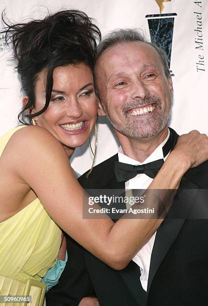 Model Janice Dickinson poses with Michael Awards president Steven Shor at the 10th Annual Michael Awards benefitting the National Children's Leukemia...