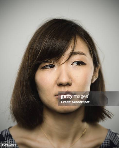 portrait of a young chinese woman looking at camera - chinese collar stockfoto's en -beelden