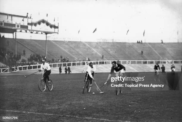 The Irish and German national teams competing in the Bicycle Polo final at the Shepherd's Bush Stadium during the 1908 London Olympics where the...