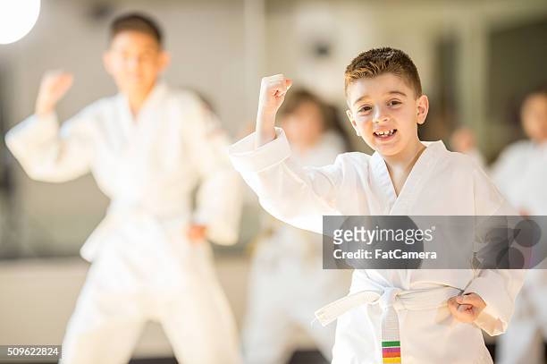 taking a self defense class - jujitsu stock pictures, royalty-free photos & images