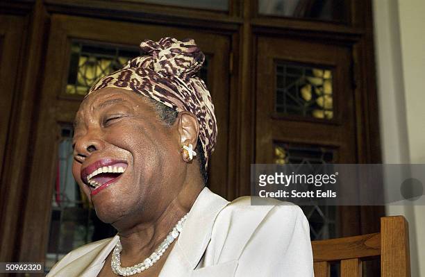 Maya Angelou laughs at the Abyssian Development Corporation's tenth annual Harlem Renaissance Day of Commitment, June 15, 2004 in New York City....