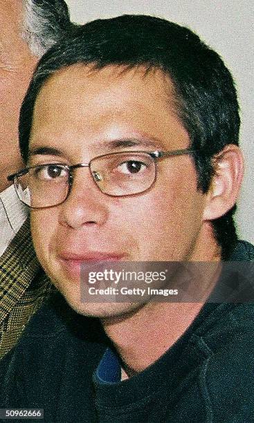 Gilad Sharon, son of Israeli Prime Minister Ariel Sharon, eats in a restaurant February 5, 2001 in Tel Aviv, Israel. The Israeli Attorney General...