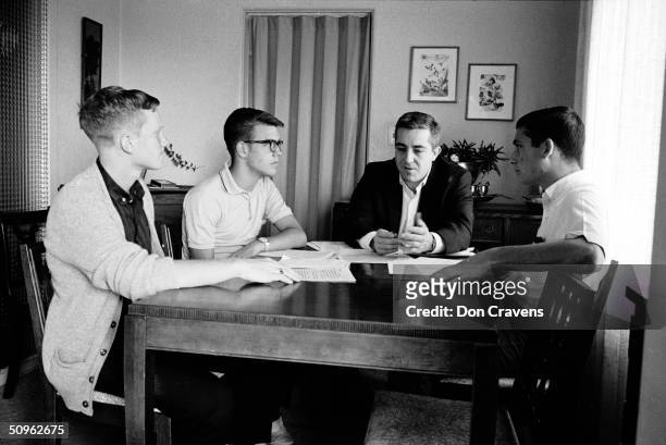 Dr. William Dement talks with American students, from left, Bruce McAllister, Randy Gardner, and Joe Marciano Jr. About a sleep deprivation...