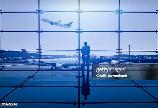 businessman waiting departure - launch of national geographic mission blue campaign stockfoto's en -beelden