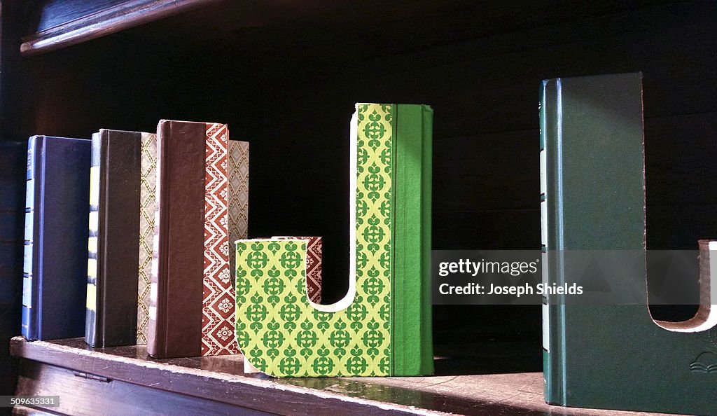 Books cut into letters of the alphabet