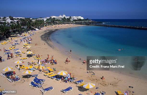 playa dorada beach, playa blanca - lanzarote stock pictures, royalty-free photos & images