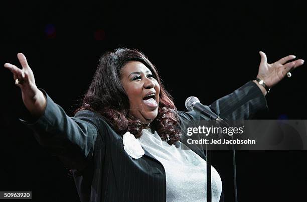 Singer Aretha Franklin performs the national anthem before the Detroit Pistons take on the Los Angeles Lakers in game five of the 2004 NBA Finals on...