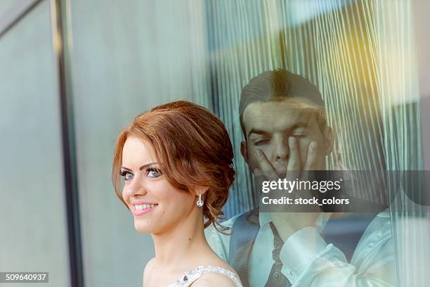 different feeling about our marriage - sad groom stock pictures, royalty-free photos & images