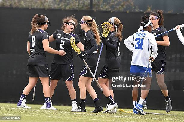 Selena Lasota of the Northwestern Wildcats celebrates her goal with teammates Danita Stroup, Shannon Nesselbush and Lydia Cassada during their game...