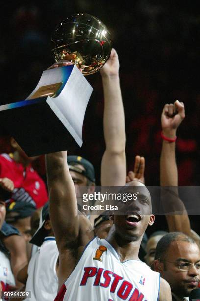 Chauncey Billups of the Detroit Pistons celebrates with the MVP trophy after defeating the Los Angeles Lakers 100-87 in game five of the 2004 NBA...
