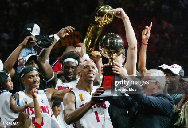 Chauncey Billups of the Detroit Pistons receives the Finals MVP trophy from NBA commissioner David Stern after defeating the Los Angeles Lakers...