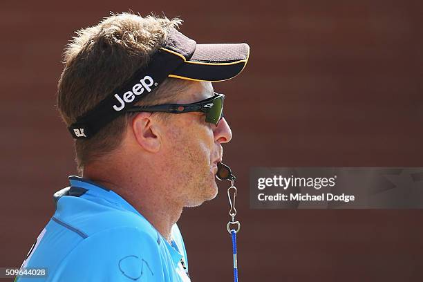 Tigers head coach Damien Hardwick blows the whistle to mak quarter time during the Richmond Tigers AFL intra-club match at Punt Road Oval on February...