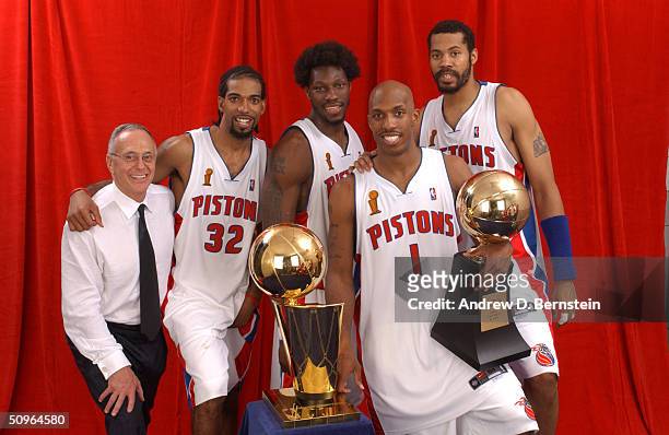Larry Brown, Richard Hamilton, Ben Wallace, Chauncey Billups and Rasheed Wallace of the Detroit Pistons pose for a portrait with the NBA Championship...