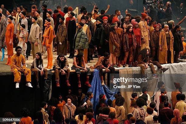 Models pose during Kanye West Yeezy Season 3 on February 11, 2016 in New York City.