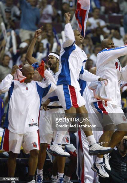 Chauncey Billups, Rasheed Wallace, Corliss Williamson and Elden Campbell of the Detroit Pistons celebrate in the second quarter of game five of the...