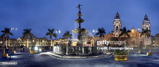 panoramic of the cathedral from the fountain, lima - plaza de armas stock pictures, royalty-free photos & images