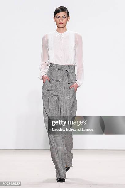 Model Alisar Ailabouni walks the runway during the Marissa Webb fashion show at The Gallery, Skylight at Clarkson Sq on February 11, 2016 in New York...