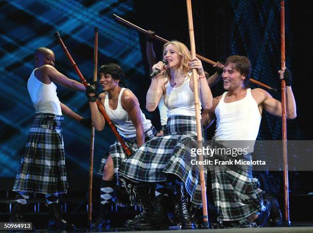 Singer Madonna performs onstage during her "Re-Invention" World Tour 2004 at the Arrowhead Pond, June 2, 2004 in Anaheim, California.