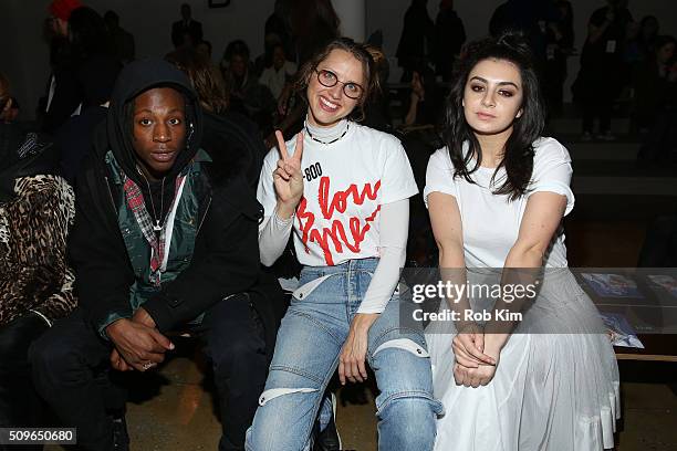 Joey Badass, Lisa Katnic and Charli XCX attend the Adam Selman fashion show during Fall 2016 MADE Fashion Week at Milk Studios on February 11, 2016...