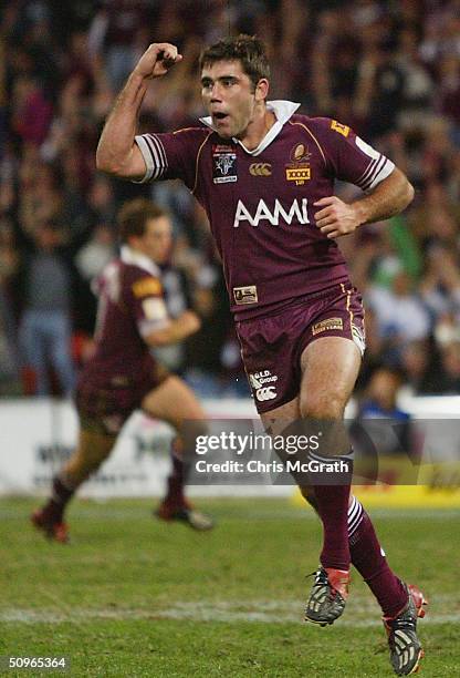 Cameron Smith celebrates victory after kicking a penalty goal during game two of the NRL State Of Origin series between the Queensland Maroons and...