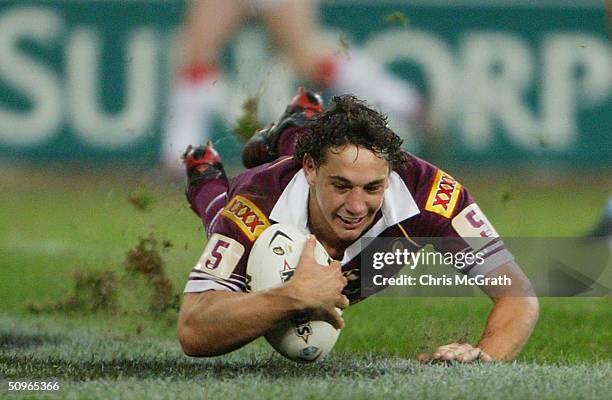 Billy Slater of the Maroons dives over for a try during game two of the NRL State Of Origin series between the Queensland Maroons and the New South...