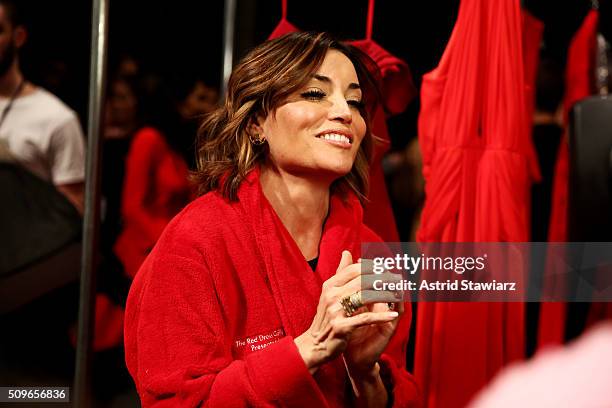 Personality Kit Hoover prepares backstage at The American Heart Association's Go Red For Women Red Dress Collection 2016 Presented By Macy's at The...