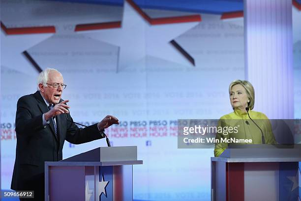 Democratic presidential candidates Senator Bernie Sanders and Hillary Clinton participate in the PBS NewsHour Democratic presidential candidate...
