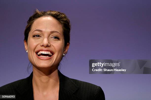 Actress and UN goodwill ambassador, Angelina Jolie, smiles during the launch of World Refugee Day at Explorers Hall at the National Geographic Museum...