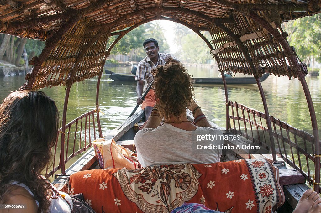 A couple on a guided boat ride in India.