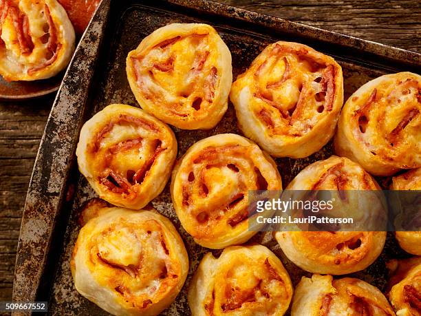 pepperoni pizza rolls - salami stock pictures, royalty-free photos & images