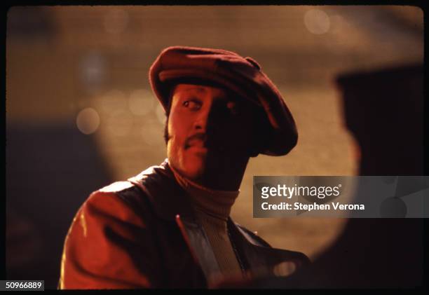 Musician Donny Hathaway sits at a piano on the stage of Royce Hall in UCLA with an empty audience during the rehearsal for Roberta Flack's Musical TV...