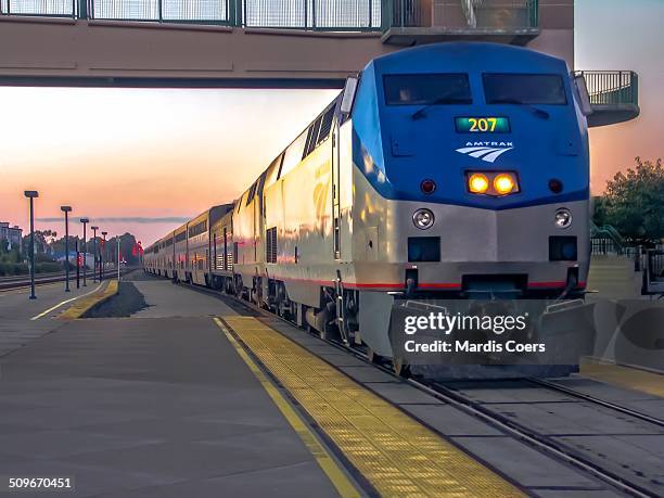 Amtrak train pulls into the train station at Emeryville, California.