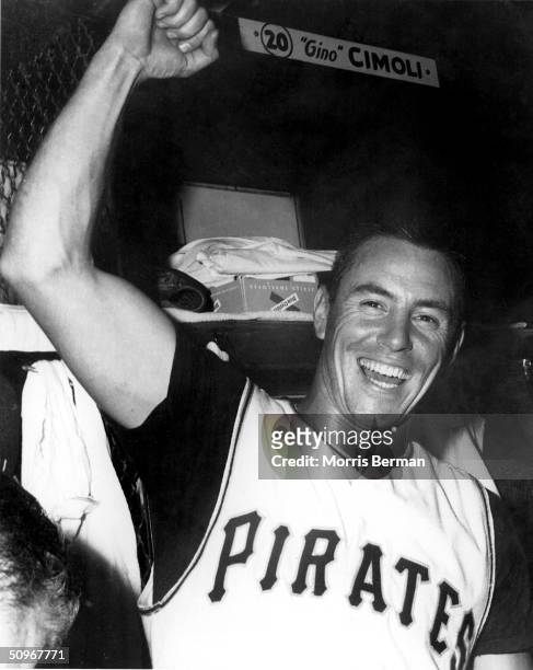 Bill Mazeroski of the Pittsburgh Pirates celebrates in the locker room after a 1960 World Series game against the New York Yankees at Forbes Field in...