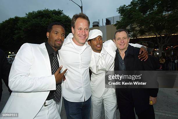 Actor Shawn Wayans, Revolution's Todd Garner, actor Marlon Wayans and Tom Sherek pose at the premiere of Revolution Studio's and Columbia Picture's...