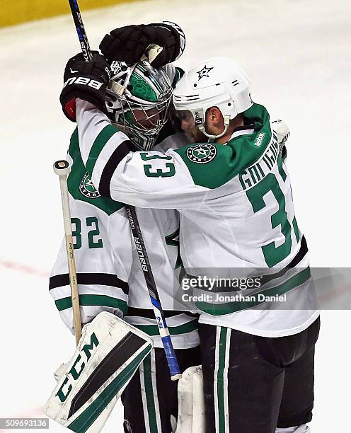 Kari Lehtonen of the Dallas Stars gets a hug from teammate John Klingberg after a win against the Chicago Blackhawks at the United Center on February...