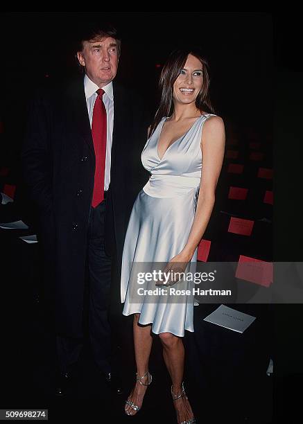 Portrait of American businessman Donald Trump and Melania Knauss Trump as they pose together before a Marc Jacobs fashion show, New York, New York,...