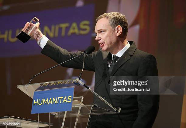 Wash Westmoreland accepts the Feature Award for "Still Alice" onstage during the 41st Humanitas Prize Awards Ceremony at Directors Guild Of America...