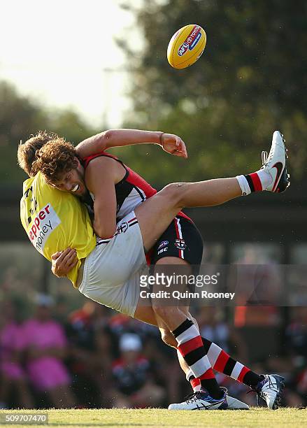 Hugh Goddard of the Saints is tackled by Tom Hickey during the St Kilda Saints AFL Intra-Club Match at Trevor Barker Beach Oval on February 12, 2016...