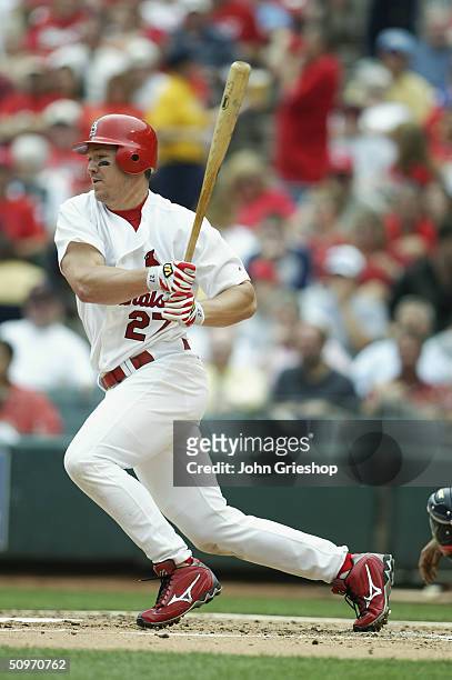 Infielder Scott Rolen of the St. Louis Cardinals swings at an Atlanta Braves pitch during the game at Busch Stadium on May 13, 2004 in St. Louis,...