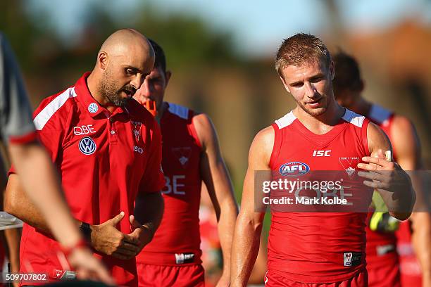 Rhyce Shaw and Kieren Jack of the Red Team speak during the half-time break the Sydney Swans AFL intra-club match at Henson Park on February 12, 2016...