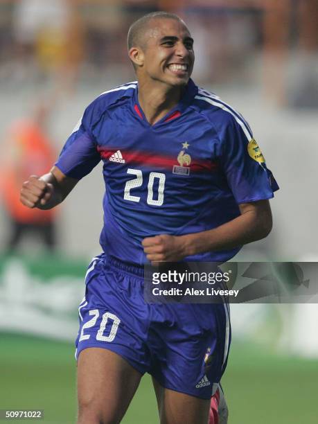 David Trezeguet of France celebrates after scoring the second goal during the UEFA Euro 2004, Group B match between Croatia and France at the Dr...