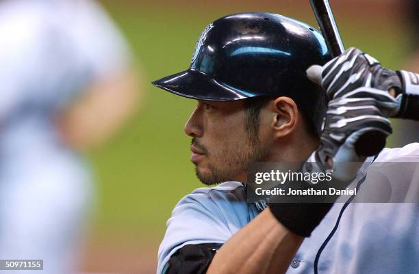 Ichiro Suzuki of the Seattle Mariners warms-up in the on-deck circle before batting during a game against the Milwaukee Brewers on June 17, 2004 at...