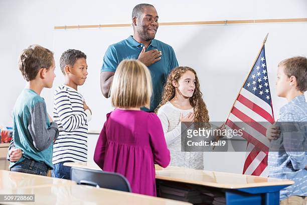 teacher and students, american pledge of allegiance - pledge stock pictures, royalty-free photos & images