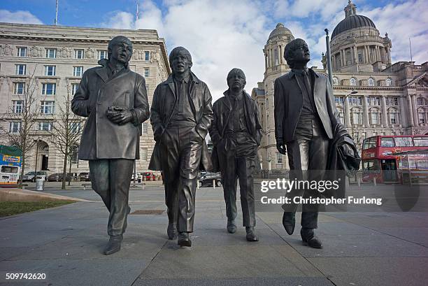 The recently unveiled new statues of Paul McCartney, George Harrison, Ringo Starr and John Lennon of the Beatles stand outside the Liver Building at...