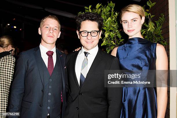 Actor Daniel Webber, Executive Producer J.J Abrams, and actress Lucy Fry attend the after party for the Hulu Original '11.22.63' premiere at Regency...